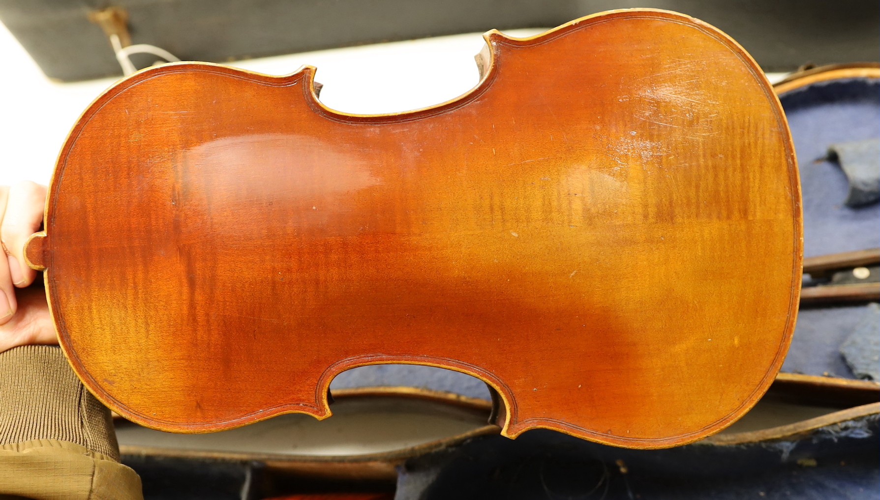 A 3/4 size violin, length of back 33cm, wooden case